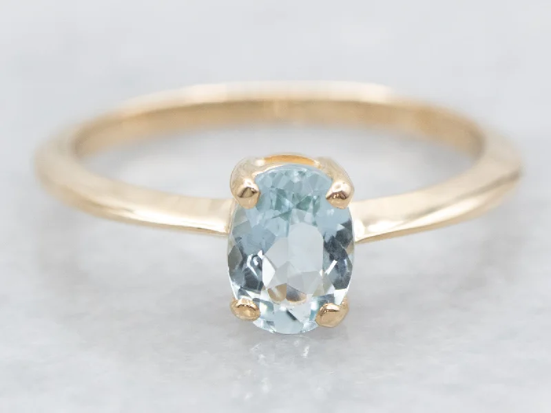 Simple Oval-Cut Aquamarine Solitaire Ring