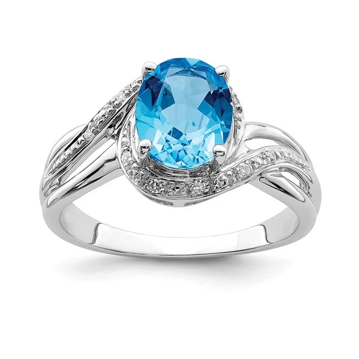 Sterling Silver Diamond And Oval Swiss Blue Topaz Ring