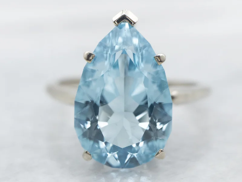 White Gold Pear Cut Blue Topaz Solitaire Ring