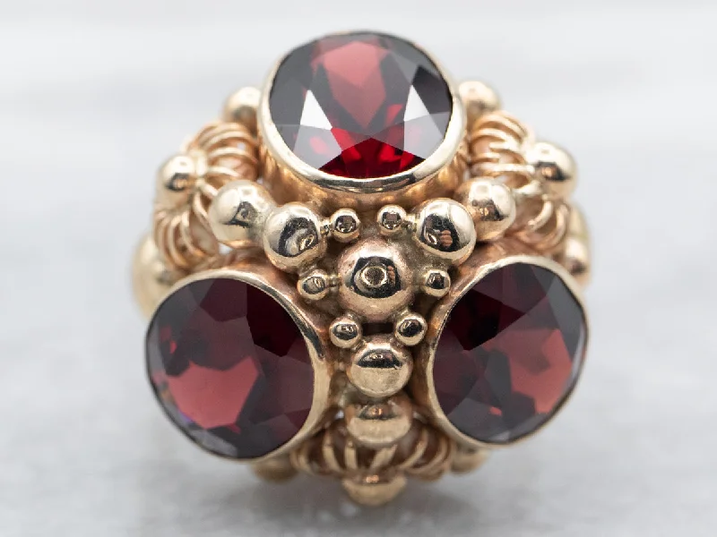 Yellow Gold Bezel Set Oval Cut Pyrope Garnet Dome Ring