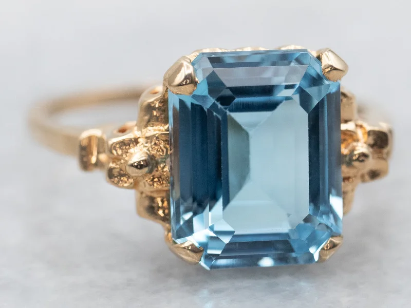 Yellow Gold Blue Topaz Solitaire Ring