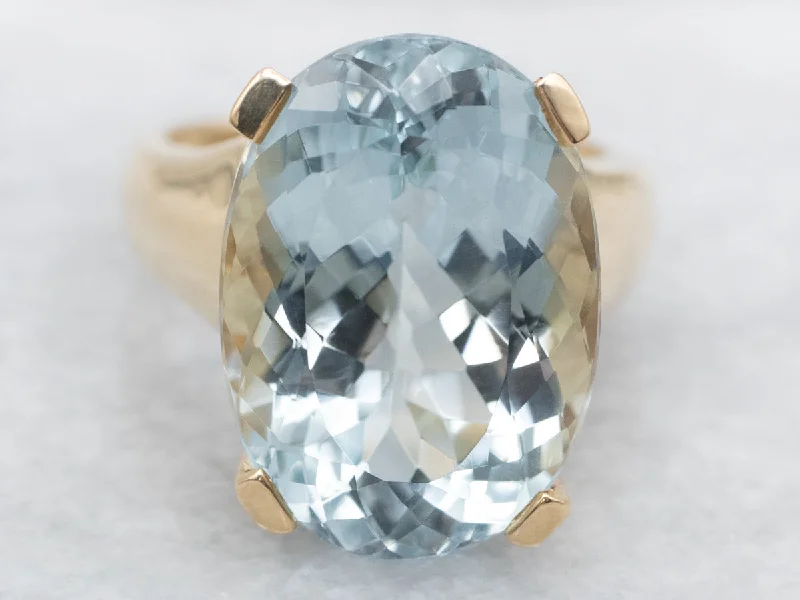 Oval Cut Blue Topaz Cocktail Ring